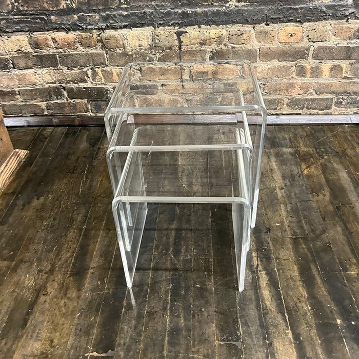 Lovely set of 3 waterfall style lucite nesting tables. They are in really good condition (some light scratches that would be expected with light use). Chicago, IL Studio Sonja Milan