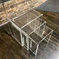 Lovely set of 3 waterfall style lucite nesting tables. They are in really good condition (some light scratches that would be expected with light use). Chicago, IL Studio Sonja Milan