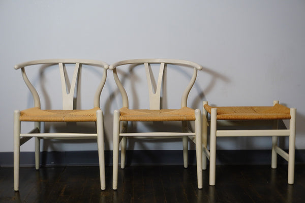 Pair of Off-White Carl Hansen Wishbone Chairs and ottoman