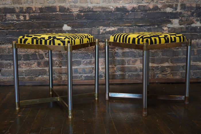 A lovely pair of Weiman Co. Upholstered Stools circa 1970. The bases feature mixed metals; brass and steel. 