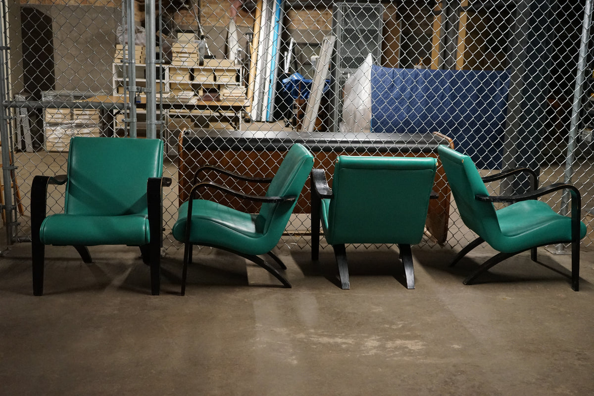 1930's Thonet bentwood lounge chair. The chair features bentwood arms and legs in black lacquer.  The chair is solidly constructed and super comfortable. 