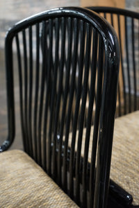 The Andover chair, designed by Davis Allen for Stendig, is a classic chair known for its blend of Danish Modern, Shaker, and Mission styles. 