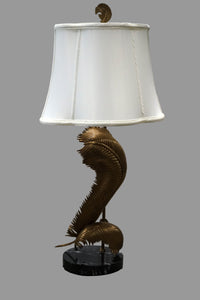 A stunning table lamp by Chapman (circa 1990's). The lamp features 2 palm fronds in brass that appear to be bent or swaying. Chicago, Studio Sonja Milan