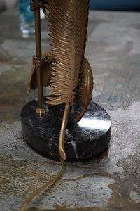 A stunning table lamp by Chapman (circa 1990's). The lamp features 2 palm fronds in brass that appear to be bent or swaying. Chicago, Studio Sonja Milan