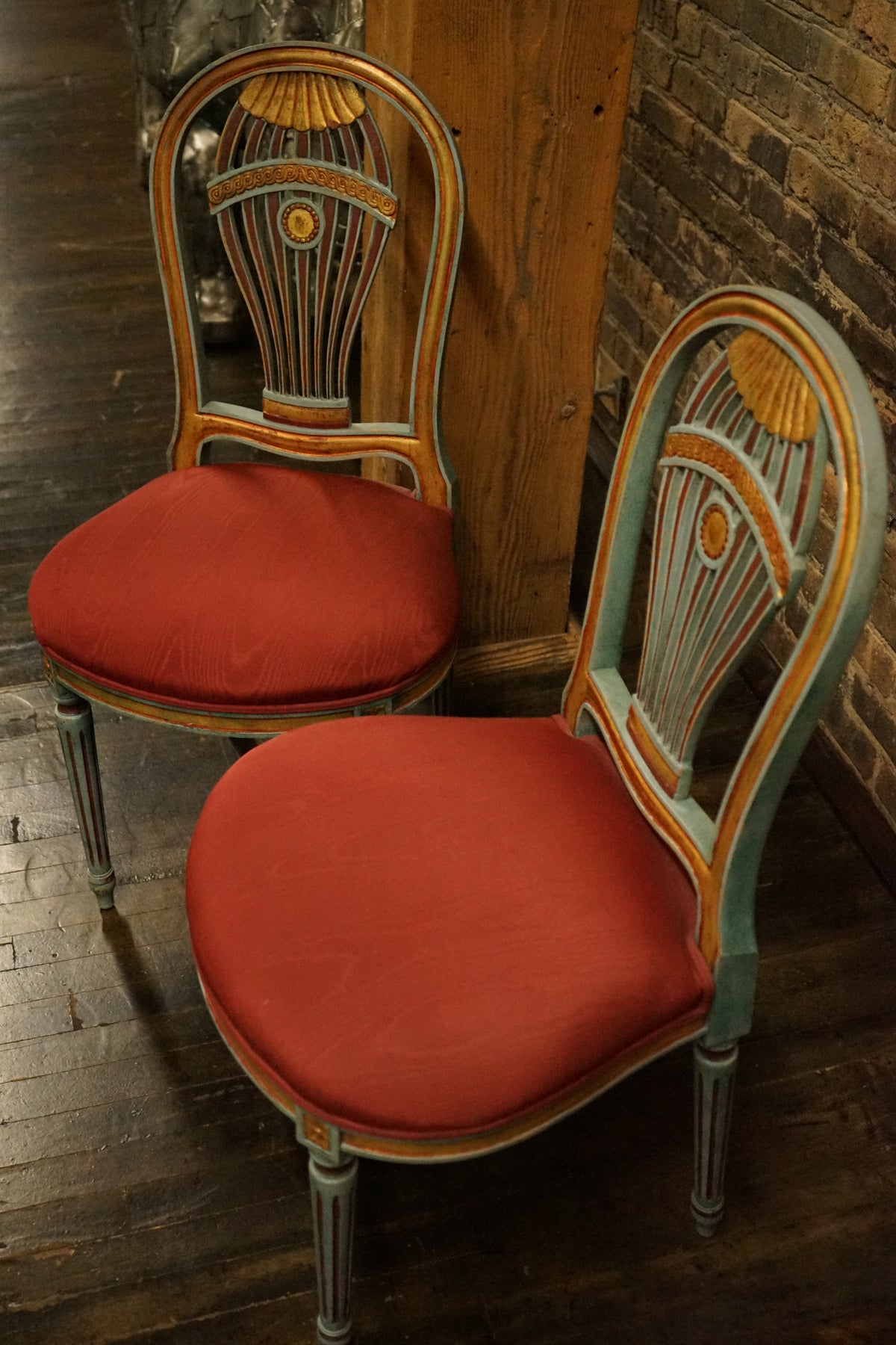 Lovely pair of Louis XVI style Montgolfiere side chairs. They are characterized by a distinctive hot air balloon-shaped backrest - or Montgolfiere. 