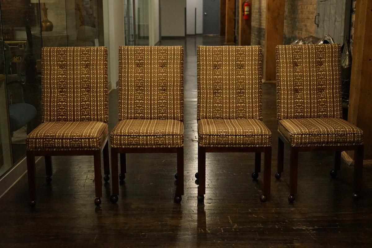 A great set of four John Widdicomb Parsons style dining chairs on castors. This set has its original upholstery. Studio Sonja Milan, Chicago, IL