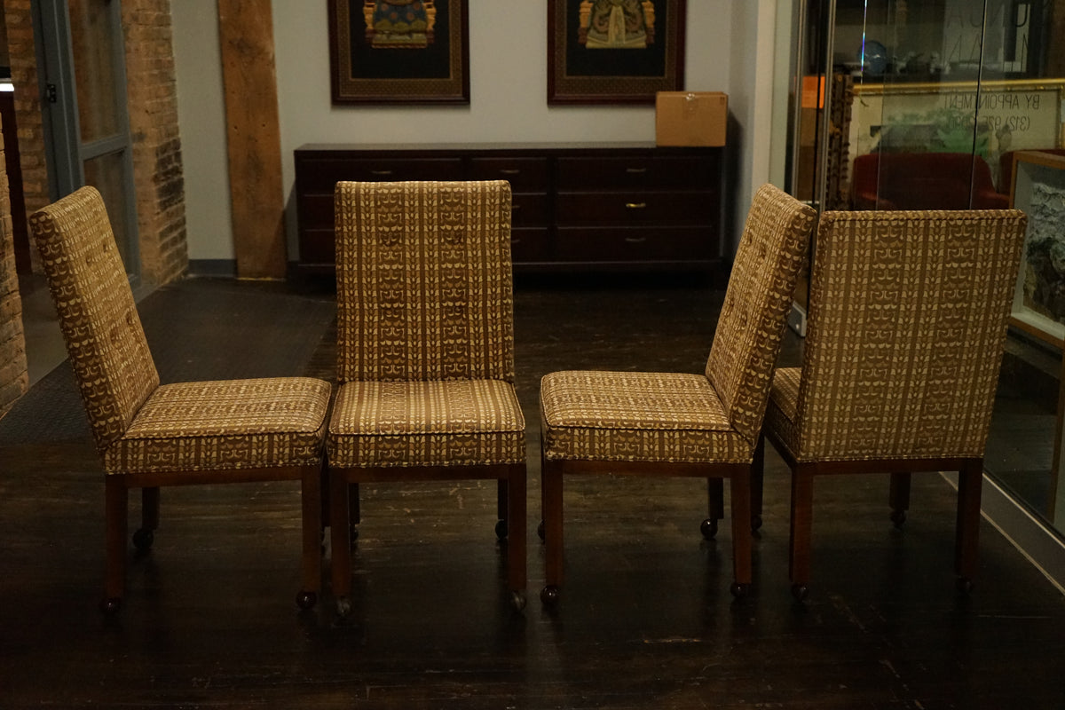 A great set of four John Widdicomb Parsons style dining chairs on castors. This set has its original upholstery. Studio Sonja Milan, Chicago, IL