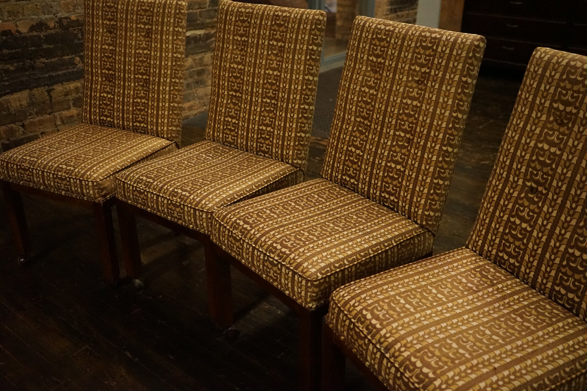 A great set of four John Widdicomb Parsons style dining chairs on castors. This set has its original upholstery. Studio Sonja Milan, Chicago, IL