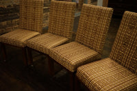 A great set of four John Widdicomb Parsons style dining chairs on castors. This set has its original upholstery. Studio Sonja Milan, Chicago, IL