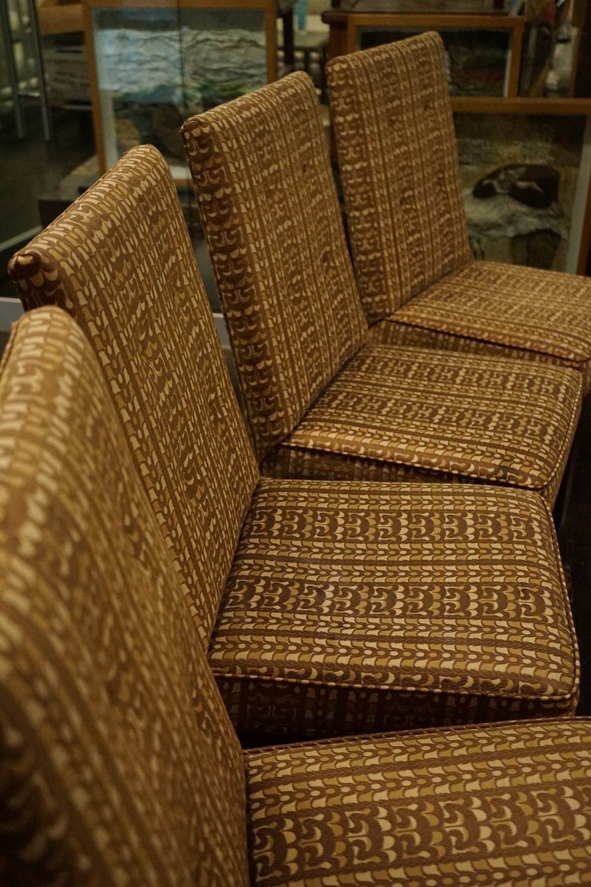 A great set of four John Widdicomb Parsons style dining chairs on castors. This set has its original upholstery. Studio Sonja Milan, Chicago, IL
