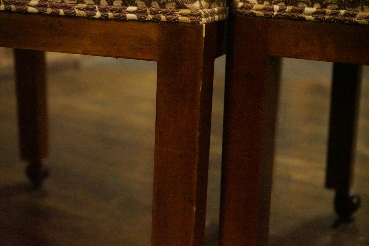 A great set of four John Widdicomb Parsons style dining chairs on castors. This set has its original upholstery. Studio Sonja Milan, Chicago, IL
