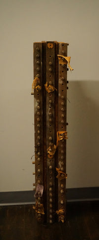 Vertical Wall Sculpture in wood and Leather by Diane Cooper