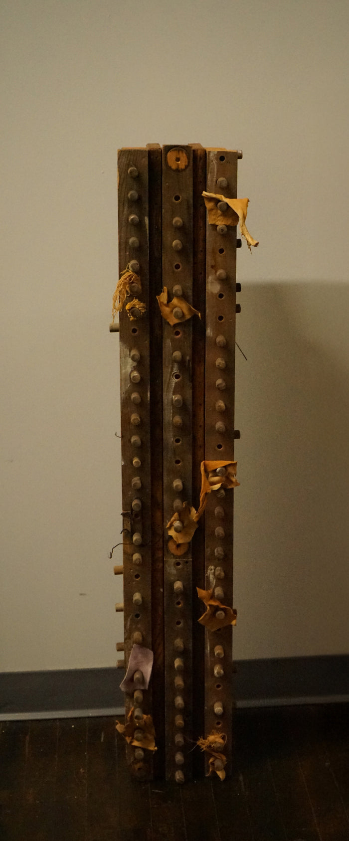 Vertical Wall Sculpture in wood and Leather by Diane Cooper