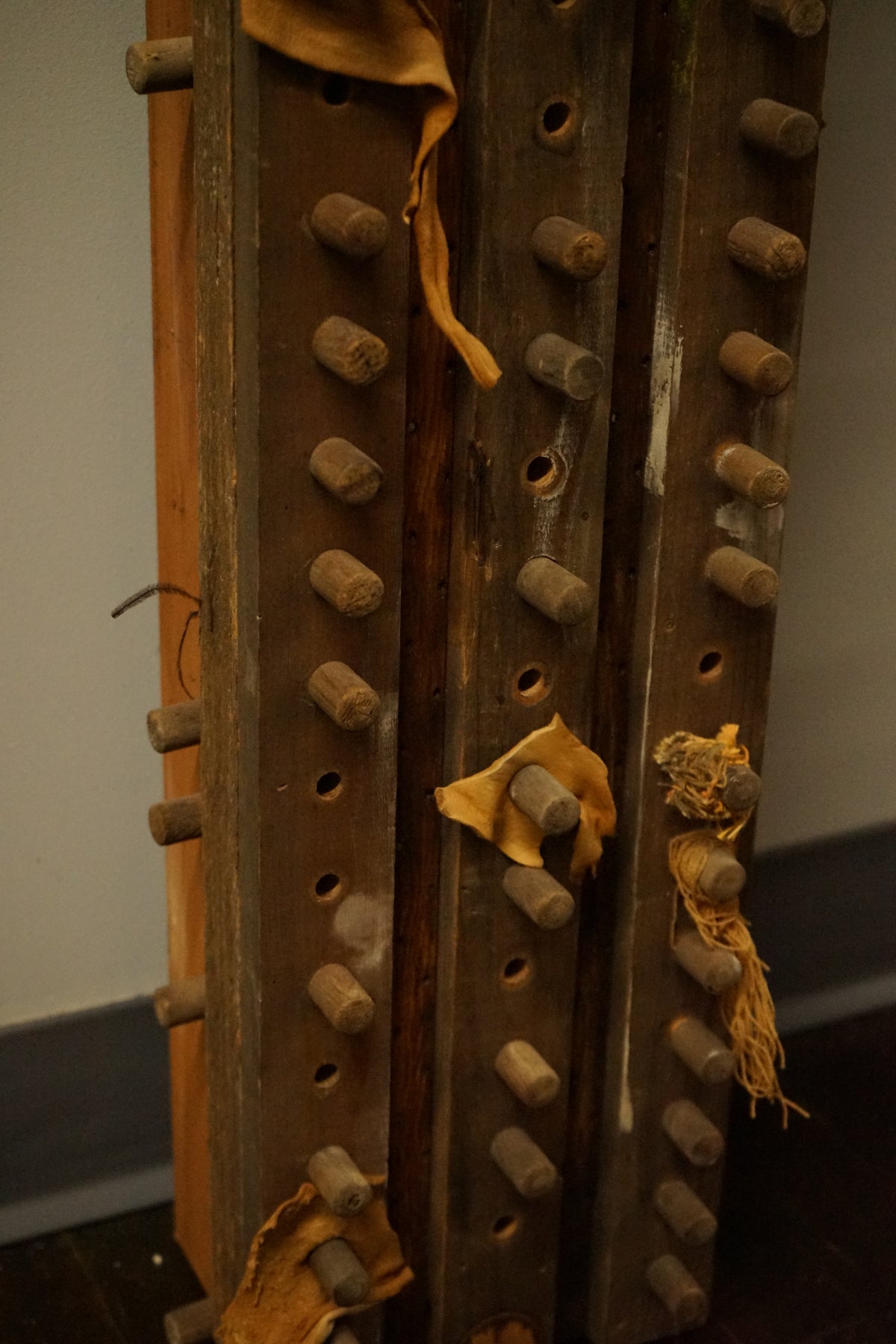 Vertical Wall Sculpture in wood and Leather by Diane Cooper