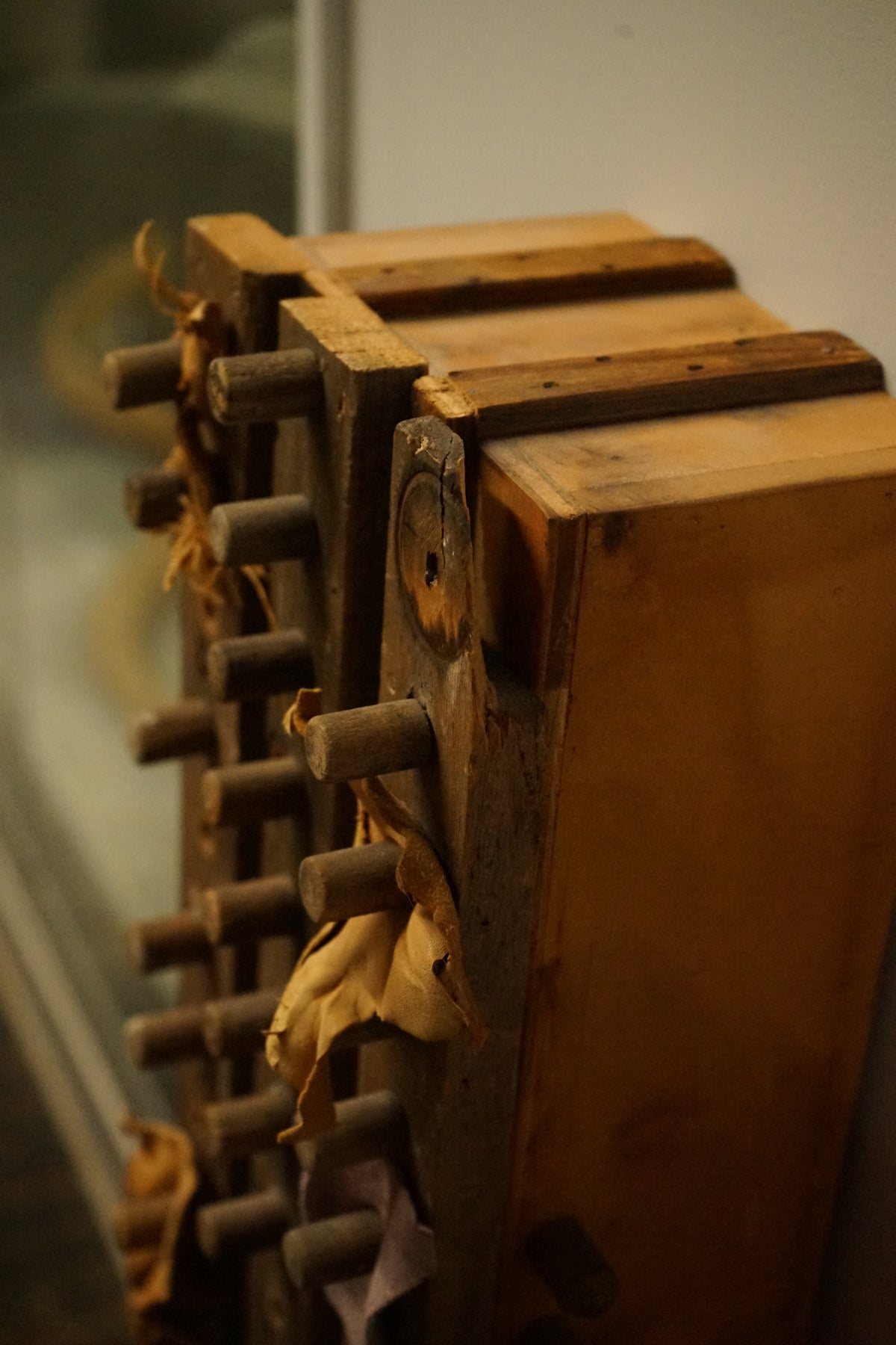 Vertical Wall Sculpture in wood and Leather by Diane Cooper