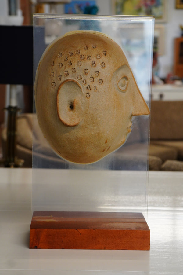 Mid-Century David Gil Split Head Stoneware Sculpture Mounted on Lucite with a Wood Base