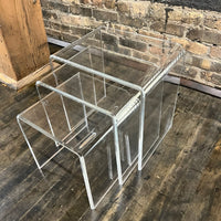 Lovely set of 3 waterfall style lucite nesting tables. They are in really good condition (some light scratches that would be expected with light use). Chicago, IL Studio Sonja Milan