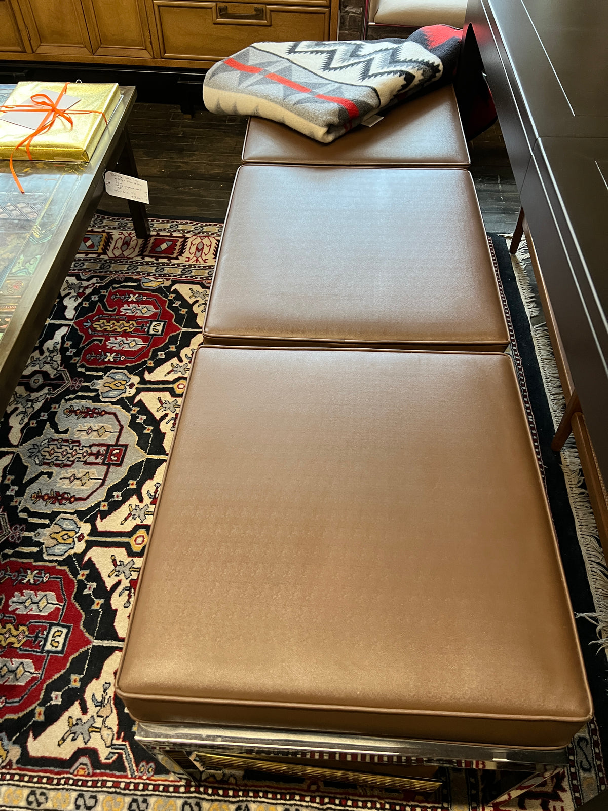 Mid century Steelcase bench with chrome base and original brown vinyl cushions. Industrial Modern, Contract Use, Chicago, Studio Sonja Milan