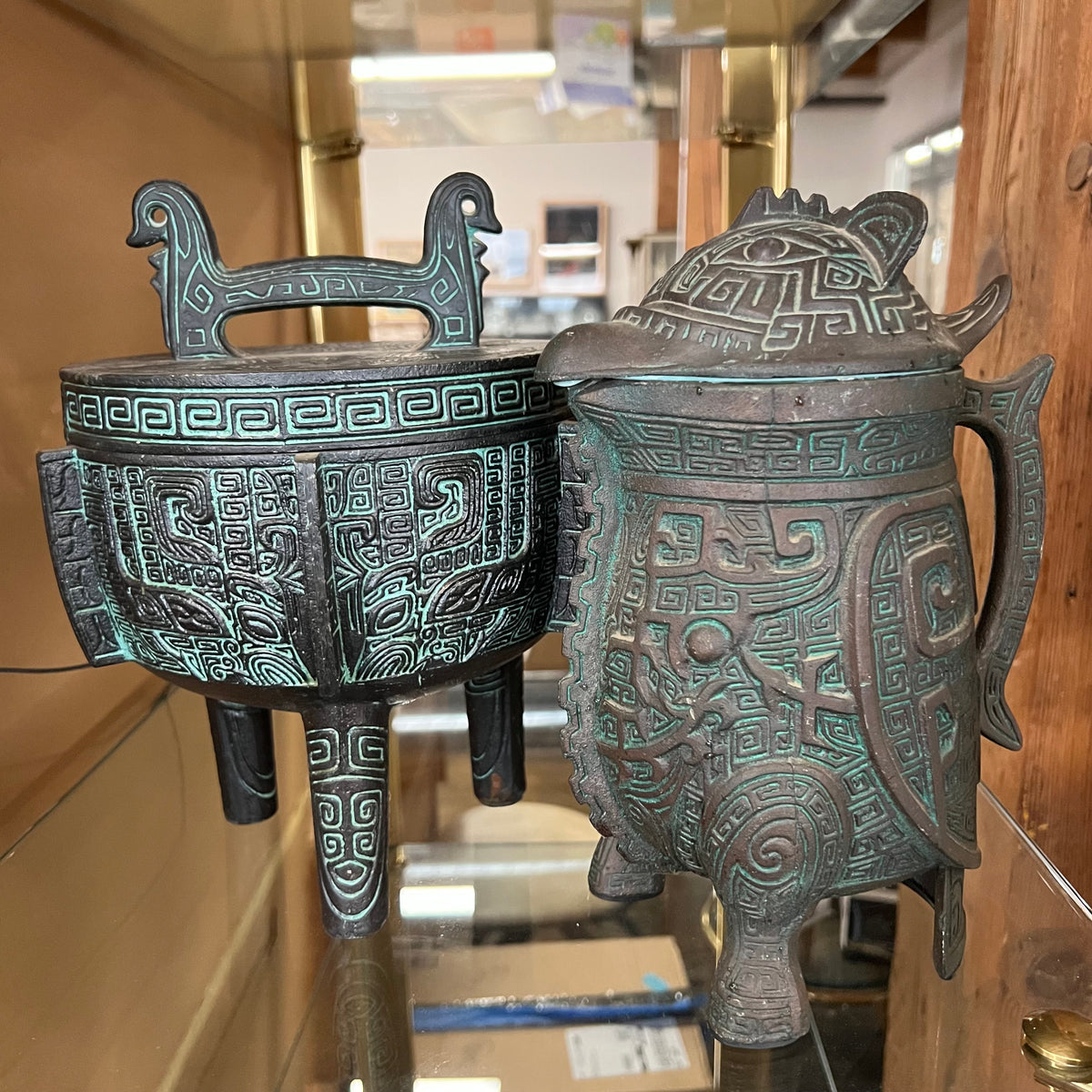 A set of James Mont-style metal (faux bronze) with verdigris finish items made in Taiwan in the 1960s, which includes an ice bucket and water pitcher. Both items are made of metal with green plastic insulation inserts - Pitcher is 4 cup capacity: Great unique wedding gift.  Midcentury barware.