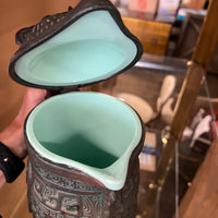 A set of James Mont-style metal (faux bronze) with verdigris finish which includes an ice bucket and water pitcher. Both items are made of metal with green plastic insulation inserts Great unique wedding gift.  Midcentury barware.