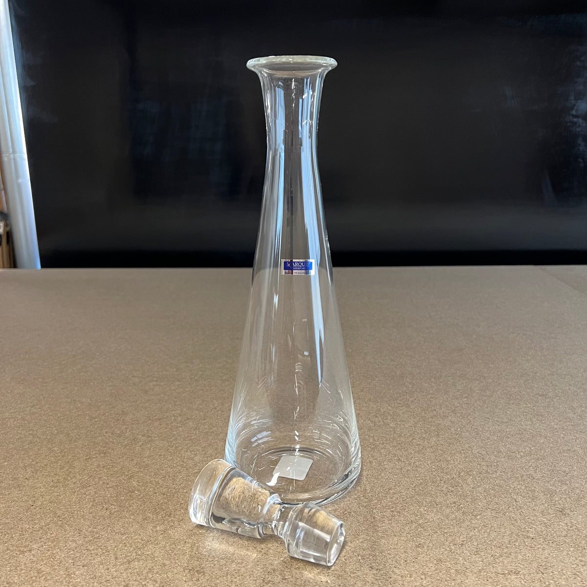 A used vintage wine decanter by Marquis Waterford.  Still retains original tags.  No box.  40oz. Lovely.  New these retailed for $150.  No longer in production.  