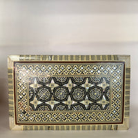 Mosiac box circa 1950's-1960's, inlaid with mother-of-pearl.  Detailed, lovely, lined in velvet.