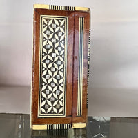 Mosiac box circa 1950's-1960's, inlaid with mother-of-pearl.  Detailed, lovely, lined in velvet.