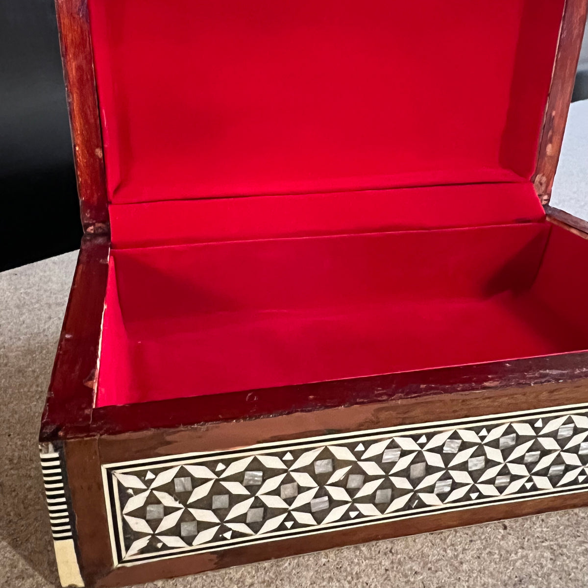 Mosiac box circa 1950's-1960's, inlaid with mother-of-pearl.  Detailed, lovely, lined in velvet.