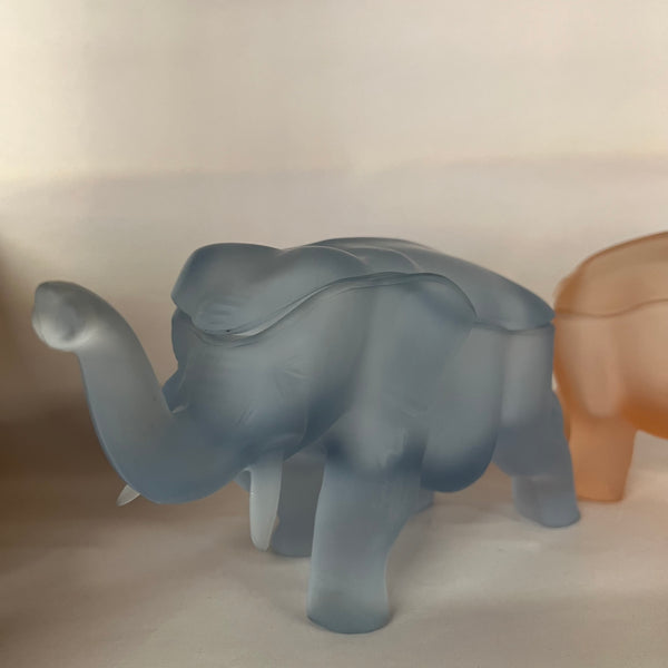 Made by Indiana Glass for Tiara, this glass elephant lidded trinket box is as unique as it is functional. Perfect for everything from buttons to jewelry to candy and more. Dates to the 1980s.