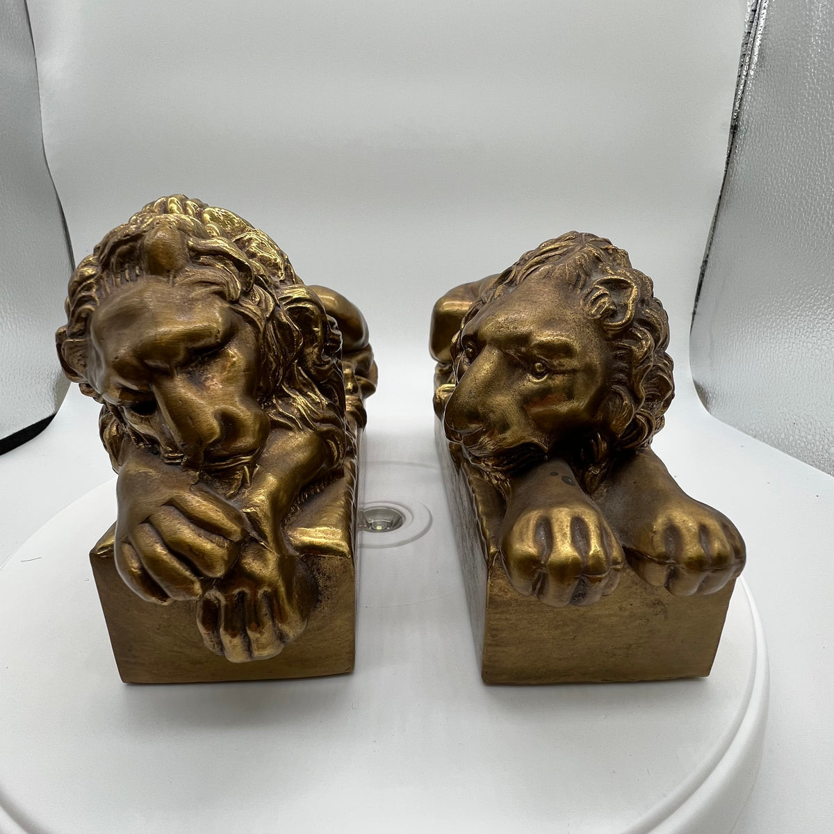 Early 20th Century pair of cast brass lions copied after Antonio Canova's marble pair created for the tomb of Pope Clement XIII in St. Peter's Rome. Some light scratches but overall in excellent condition.  Gifts for an avid reader.  Bookends, brass, Chicago, IL