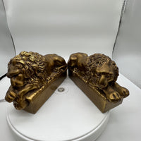 Early 20th Century pair of cast brass lions copied after Antonio Canova's marble pair created for the tomb of Pope Clement XIII in St. Peter's Rome. Some light scratches but overall in excellent condition.  Gifts for an avid reader.  Bookends, brass, Chicago, IL