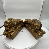 Early 20th Century pair of cast brass lions copied after Antonio Canova's marble pair created for the tomb of Pope Clement XIII in St. Peter's Rome. Some light scratches but overall in excellent condition.  Gifts for an avid reader.  Bookends, brass, Chicago, IL