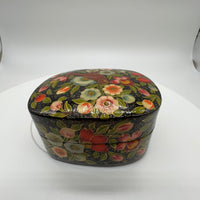 Lovely and finely detailed hand-painted Kashmiri paper cache trinket box. Features flowers, leaves and a bird on a black background.All sides and top of box are painted. 