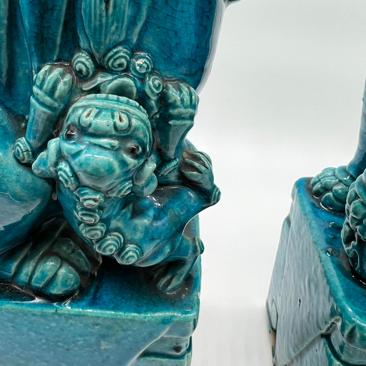 Large and lovely pair of Chinese Foo Dogs, biscuit-turquoise colored male and female foo dogs. &nbsp;Circa 1880