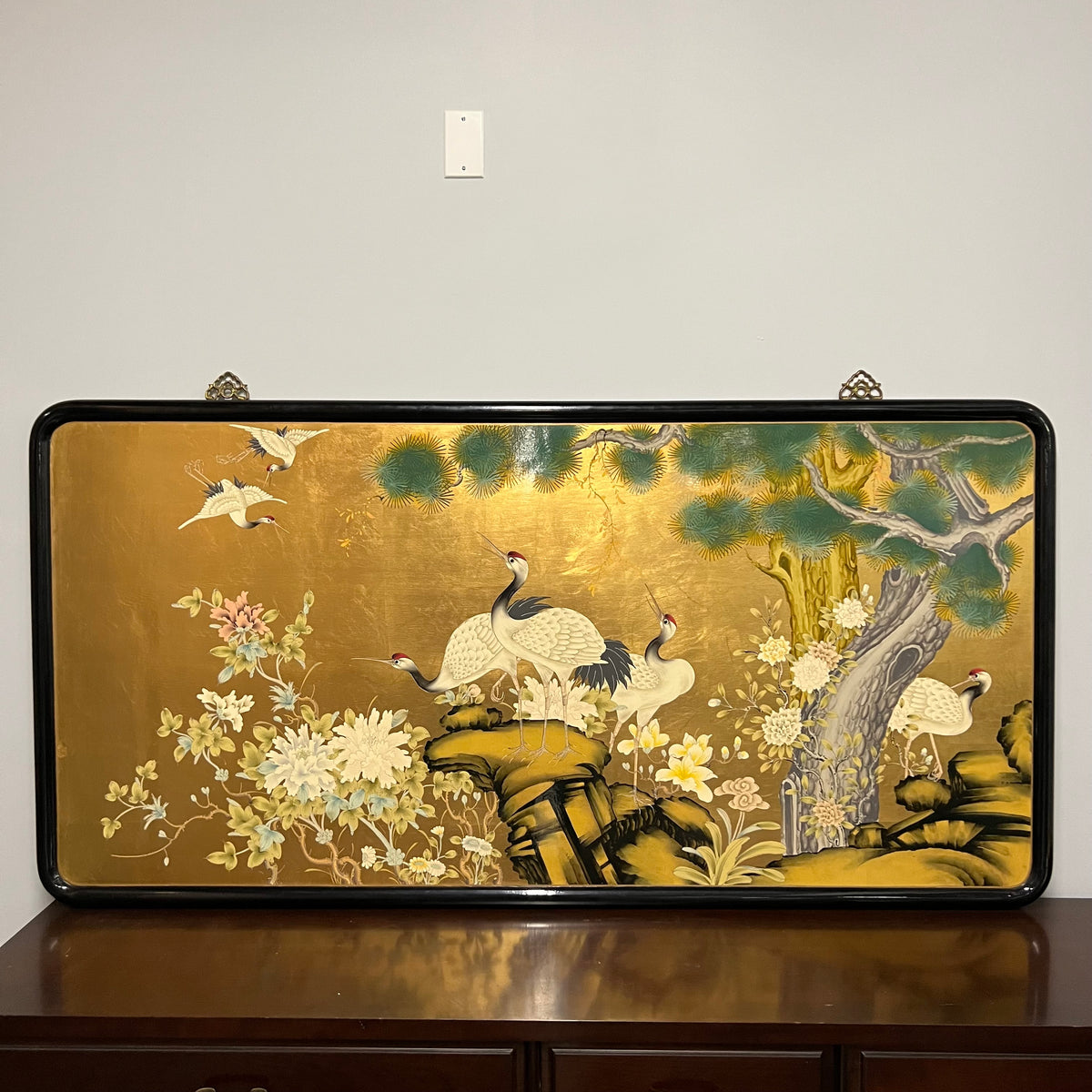Lovely midcentury painting of cranes and chrysanthemums painted on a solid wood board.  Bright colors and gold leaf 