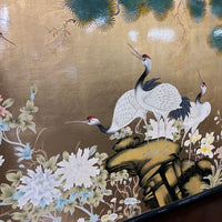 Lovely midcentury painting of cranes and chrysanthemums painted on a solid wood board.  Bright colors and gold leaf 