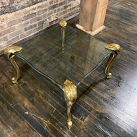 Lovely mid-century side table  with 4 brass legs that support a floating fluted glass top.  In the style and manner of Maison Jansen and P.E. Guerin