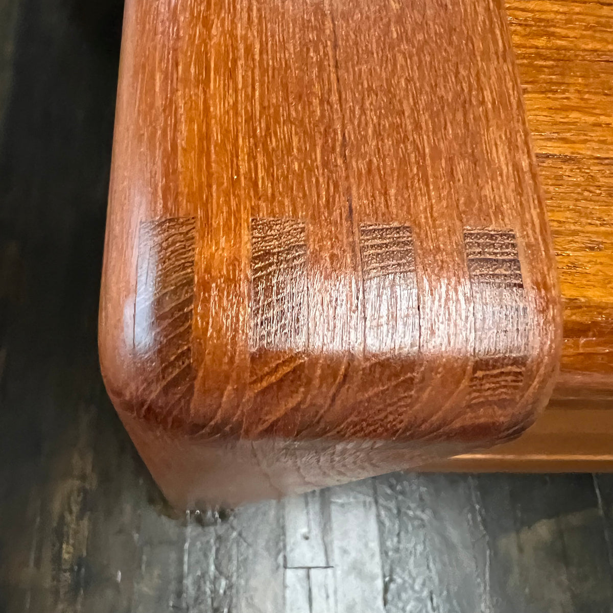 Mid-century executive floating top desk by H.P. Hansen manufactured in Demark circa 1970s. This beautiful desk was made of the highest quality teak.  The back of the desk is completely finished and has one inset opening that can be used for book storage or to display decorative items. STUDIO SONJA MILAN, Chicago, IL