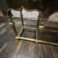 Lovely Hollywood Regency Console Table attributed to Mastercraft.  Burl wood top and apron with brass detail.  It sits on 8 brass legs with brass supports between the legs.  