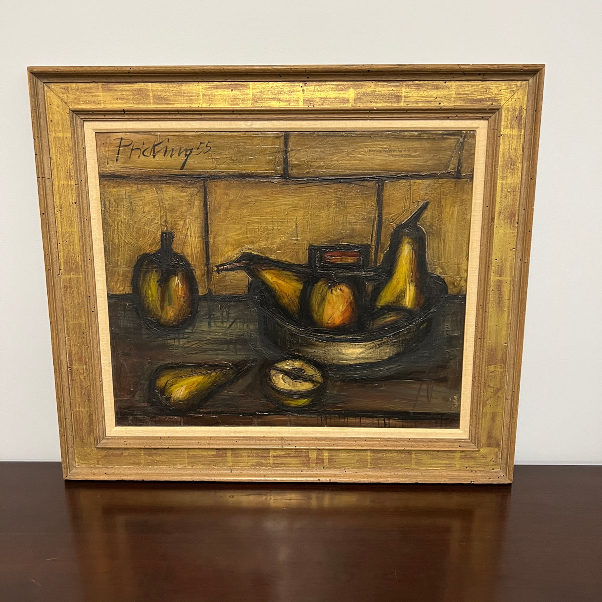 Stunning still life of fruit by German artist Franz Priking. Painted primarily in shades of gold, deep green and black and housed in a beautiful frame that has gilded accents.  Dated 1955, Studio Sonja Milan, Chicago, IL