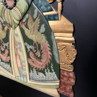 Lovely and large pair of chinoiserie art pieces on wood board.  The images of the emperor and empress are somewhat two dimensional.