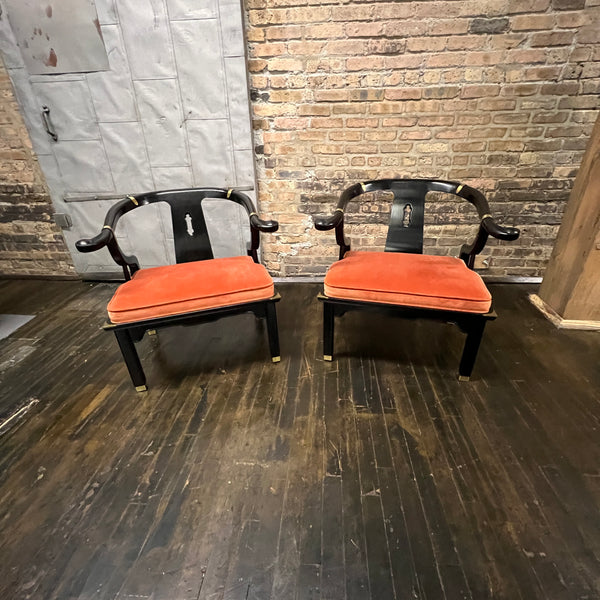 A lovely pair of large Chinese ming style horseshoe lounge chairs made by Century Furniture. Originally designed by James Mont these chairs epitomize his over the top dramatic mid-century modern style with a unique Asian flare. 