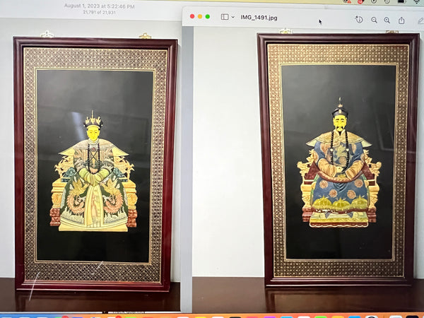 Lovely and large pair of chinoiserie art pieces on wood board.  The images of the emperor and empress are somewhat two dimensional.