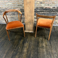 Pair of Mid century walnut dining chair designed by Bertha Schaefer for Singer & Sons (the original labels are missing).  The chair are in excellent original condition.  The seats were just rewebbed and reupholstered in a spice colored velvet.  One of the most stunning examples of mid-century design. 