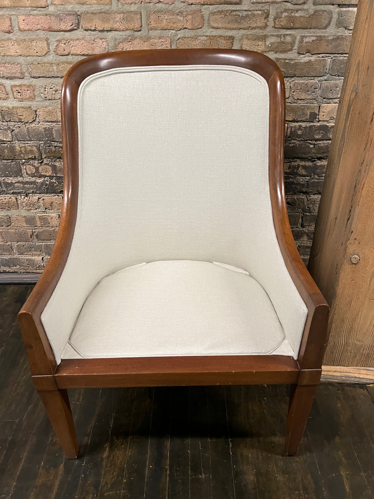 Pair of chairs with lovely solid walnut frames and very light gray linen upholstery (on the front of the chair and the seat cushions). The seat cushions are down filled. The back of the chair is upholstered in a coordinating cut velvet that has shades of cream, black and gray. 
