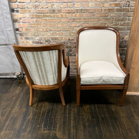 Pair of chairs with lovely solid walnut frames and very light gray linen upholstery (on the front of the chair and the seat cushions). The seat cushions are down filled. The back of the chair is upholstered in a coordinating cut velvet that has shades of cream, black and gray. 