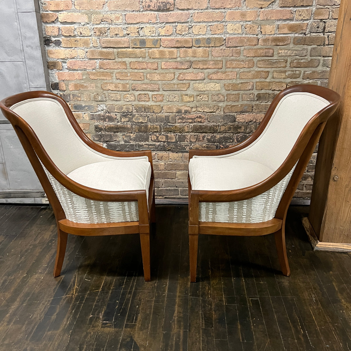 Pair of chairs with lovely solid walnut frames and very light gray linen upholstery (on the front of the chair and the seat cushions). The seat cushions are down filled. The back of the chair is upholstered in a coordinating cut velvet that has shades of cream, black and gray. 