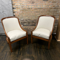 Pair of chairs with lovely solid walnut frames and very light gray linen upholstery (on the front of the chair and the seat cushions). The seat cushions are down filled. The back of the chair is upholstered in a coordinating cut velvet that has shades of cream, black and gray. 