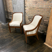 Pair of chairs with lovely solid walnut frames and very light gray linen upholstery (on the front of the chair and the seat cushions). The seat cushions are down filled. The back of the chair is upholstered in a coordinating cut velvet that has shades of cream, black and gray. 