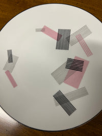 Noritake dinner service for 8 - pattern is number 1357. It has a pink and black pattern - very retro. The set was initially for 12...but as pieces were lost over the years there are now only 9 full sets plus a few extra pieces.  Studio Sonja Milan, Chicago, IL